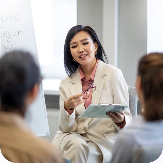 A leader in discussion with their team